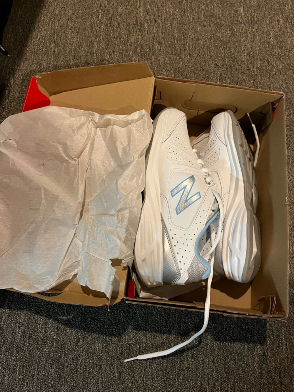 New Balance White Sneakers with Light Blue 'N' Logo